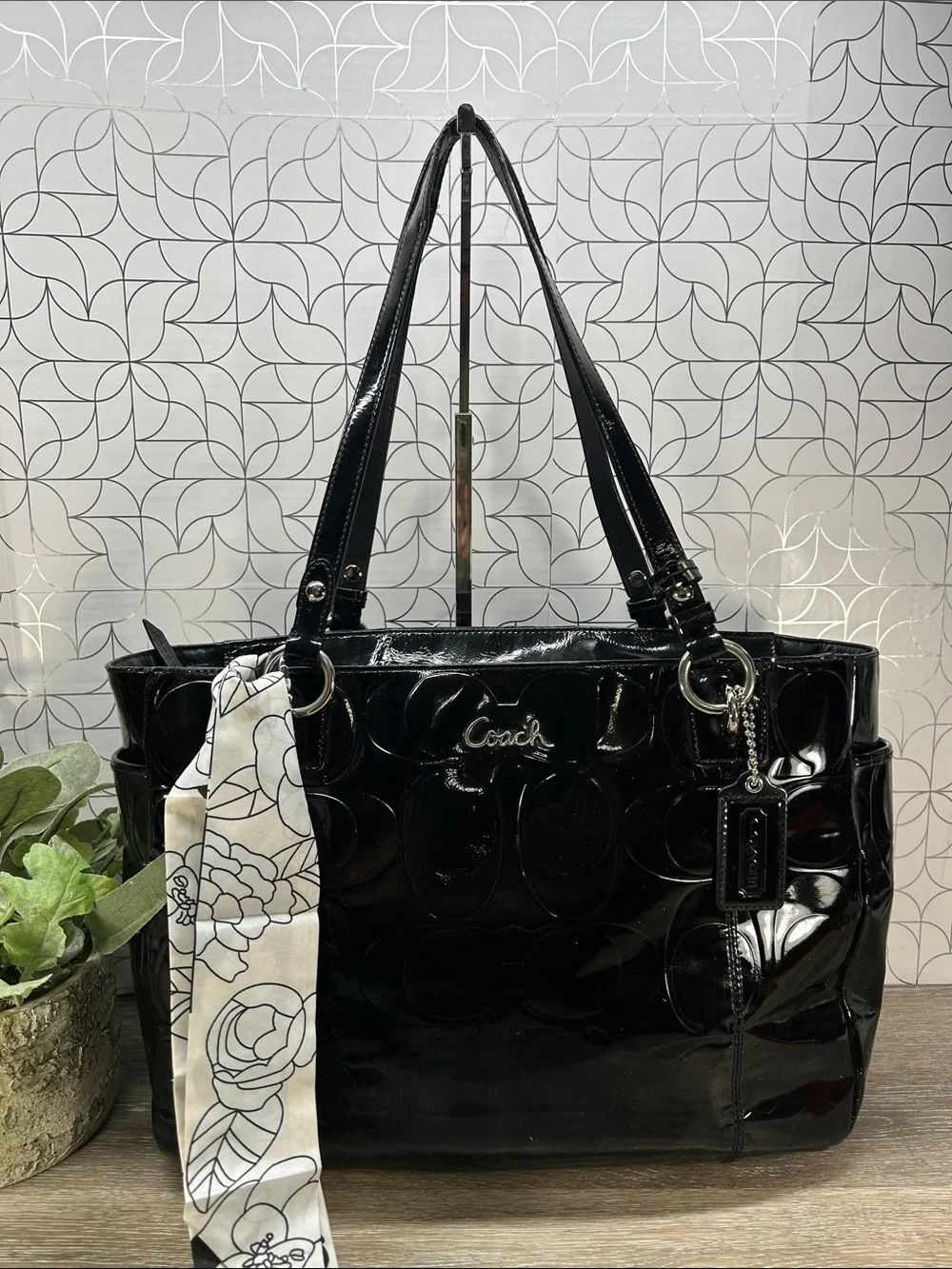 Coach black patent leather zip top tote bag